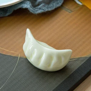 Ceramiczne podstawki pod pałeczki w kształcie pierożka — zestaw 2 szt. Czarny