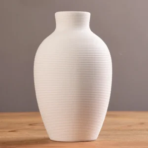 Ceramiczny wazon nordycki do salonu z kwiatami i roślinami żółty