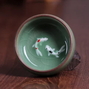 Porcelanowe filiżanki do herbaty Longquan Celadon ze złotą rybką Jasnoszary