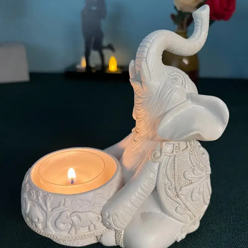 Świecznik na tealight słoń z uniesioną trąbą — figurka dekoracyjna Biały