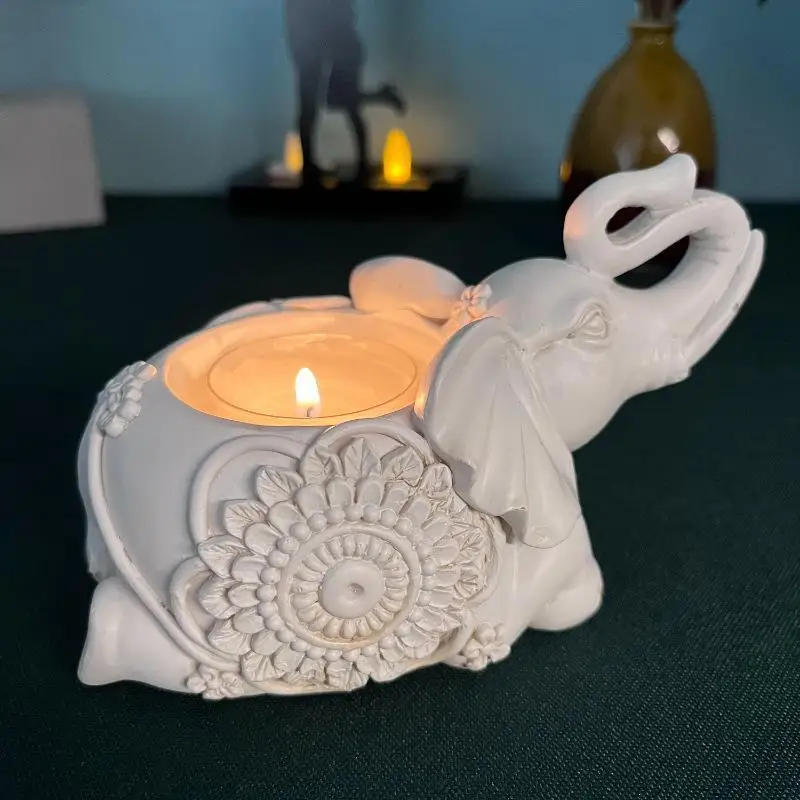 Świecznik na tealight słoń z uniesioną trąbą — figurka dekoracyjna Srebrny